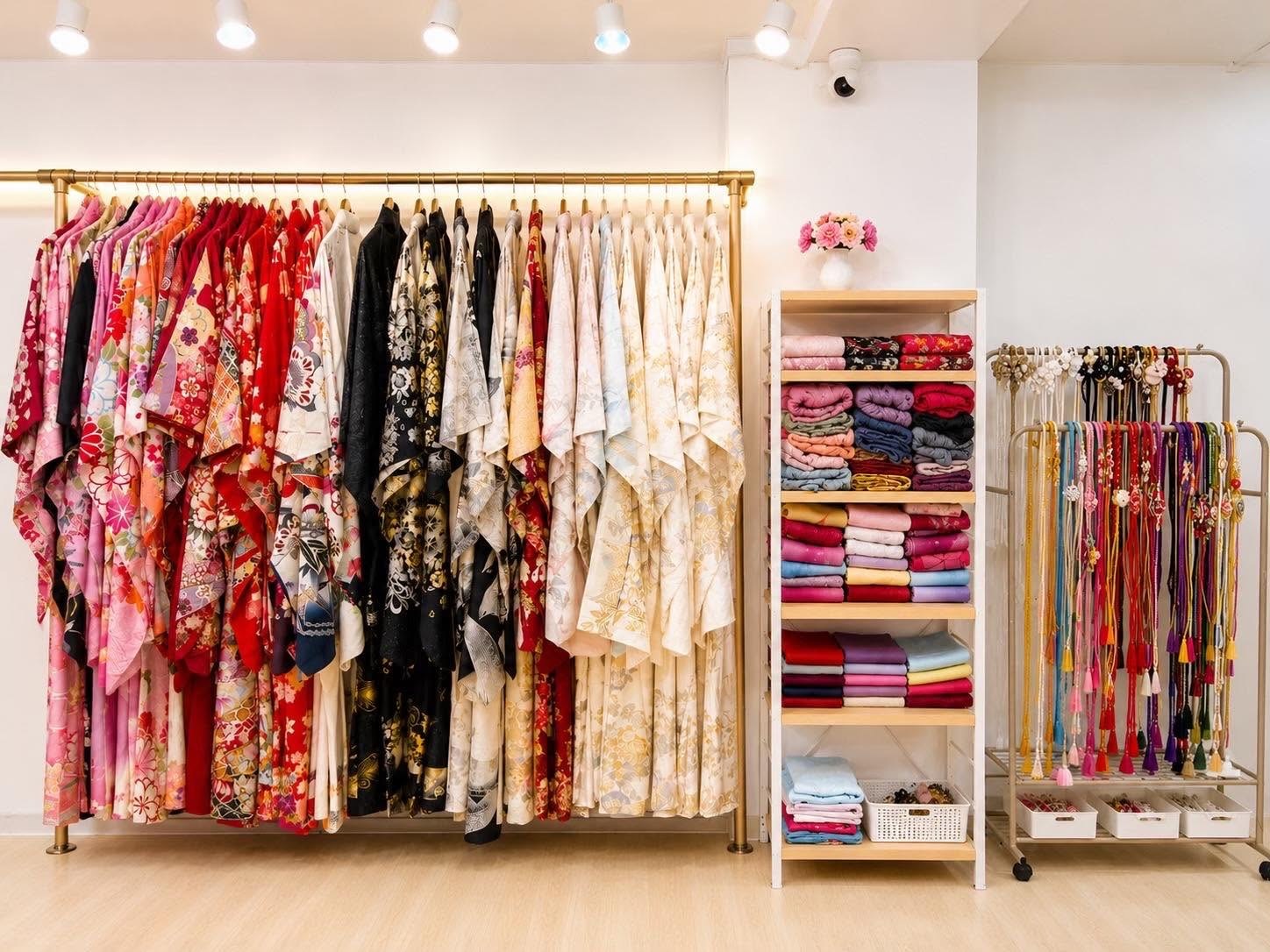 Racks of kimono, folded obi and accessories at the LYAN studio